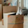 brown cardboard box on brown wooden table